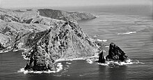 Pinnacle Rock and Cape Colville in 1959 Pinnacle Rock, Cape Colville.jpg