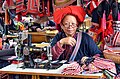 Red Dao seamstress, Vietnam