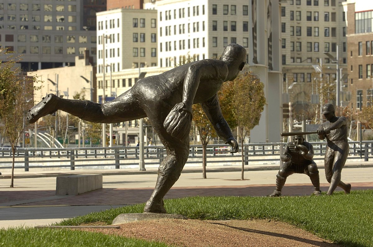 Sculptor Tom Tsuchiya's statues outside the Great American Ballpark, home  of the Cincinnati Reds' baseball team, salute three legendary Reds'  players: pitcher Joe Nuxhall, catcher Ernie Lombardi, and slugging  outfielder Frank Robinson