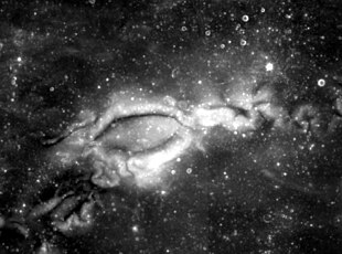 The lunar swirl known as Reiner Gamma (60 km width), seen at 750 nm by the Clementine spacecraft (July 2011) Reiner-gamma-clem1.jpg