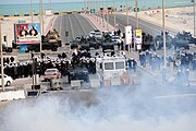 Riot police fire tear gas 16 March.jpg