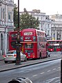 RM871 25 August 2012 End of Strand, waiting to enter Trafalgar Square (right hand lane suggesting an immediate run around the Charing Cross roundabout) Blinds set to Not in Service