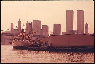 Pier 42 in 1974 SHIPPING PIERS OF BROOKLYN, NEW YORK, WITH MANHATTAN IN THE BACKGROUND. THE NEW YORK, NEW JERSEY METROPOLITAN REGION... - NARA - 555726.jpg
