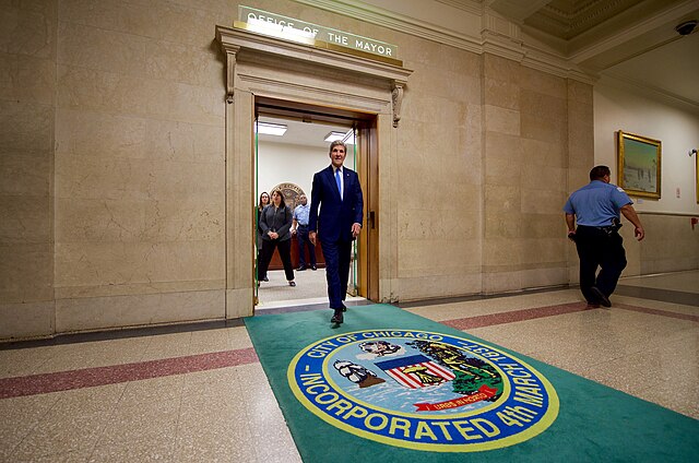 U.S. Secretary of State John Kerry leaving "The Fifth Floor" office of the mayor in 2016
