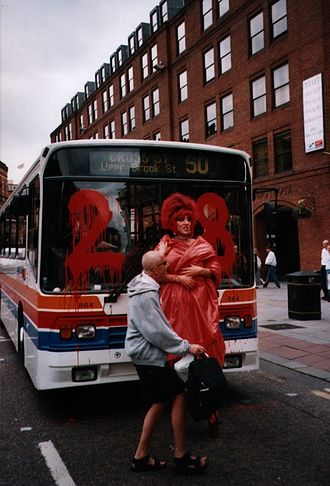Section 28 protestor with a Stagecoach Manchester bus in July 2000 Section28-cropped.jpg
