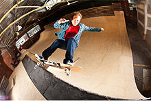 Globe International founder Stephen Hill vert skateboarding on a large half-pipe Stephen Hill-skateboarding 2010.jpg