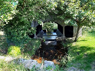 Tirelagüe alimentant le lavoir de Bel Air à Mimizan