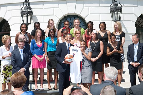 The players, coaches, and other staff of the 2008–09 UConn Huskies, winners of the 2009 national championship, are honored at the White House by Presi