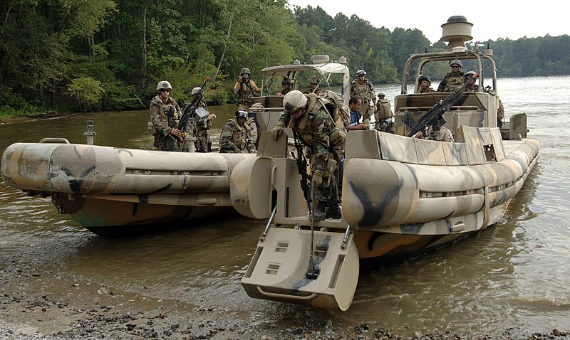 File:US Navy 070910-N-6639M-043 Sailors assigned to Riverine Squadron (RIVRON) 2 come ashore with two simulated detainees to be turned over to Mobile Security Squadron 3, Det. 33, during COMET 2007.jpg