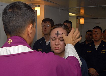 US Navy 080206-N-7869M-057 Electronics Technician 3rd Class Leila Tardieu receives the sacramental ashes during an Ash Wednesday celebration.jpg