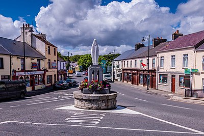 View of the statue at the centre of the town of Crossmolina, County Mayo, Ireland.jpg