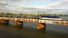 A VRE train crossing the Potomac River in 2013. Virginia Express at Potomac river (8682502764).jpg