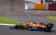 Lando Norris driving the McLaren MCL35M at the 2021 British Grand Prix 2021 British Grand Prix (51350004859).jpg