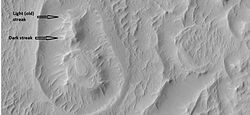 Close-up of circular structure from previous image.  Streaks are also visible.