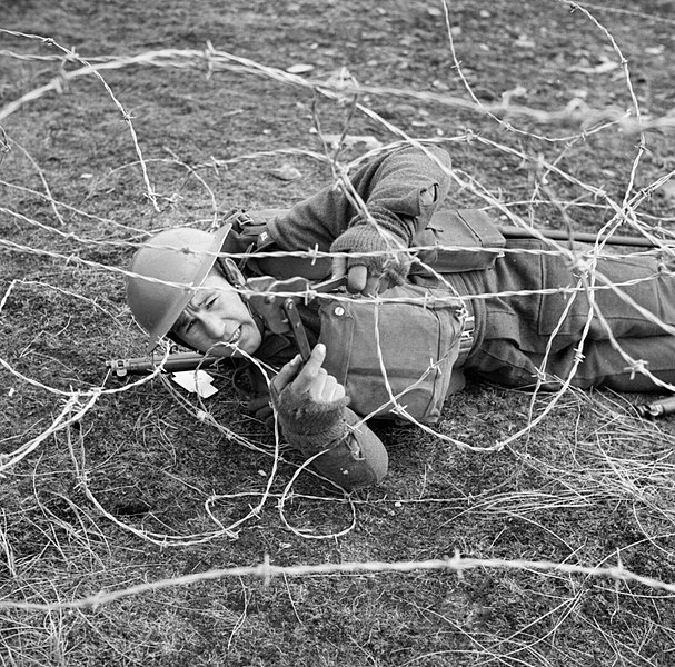 File:A soldier of the 7th Battalion, The Black Watch, cuts through barbed wire during training at Sumburgh in the Shetland Islands, 20 April 1941. H9025.jpg