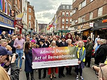 The 2023 act of remembrance marking the anniversary of the bombing Admiral Duncan Act of Remembrance, Old Compton Street, Soho, April 2023 02.jpg