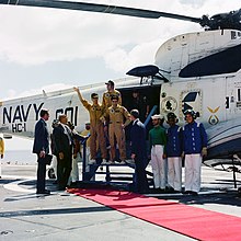 Apollo 17 crew arrive aboard Ticonderoga on 19 December 1972 Apollo 17 crewmembers arrive aboard USS Ticonderoga (CVS-14) on 19 December 1972 (S72-55937).jpg