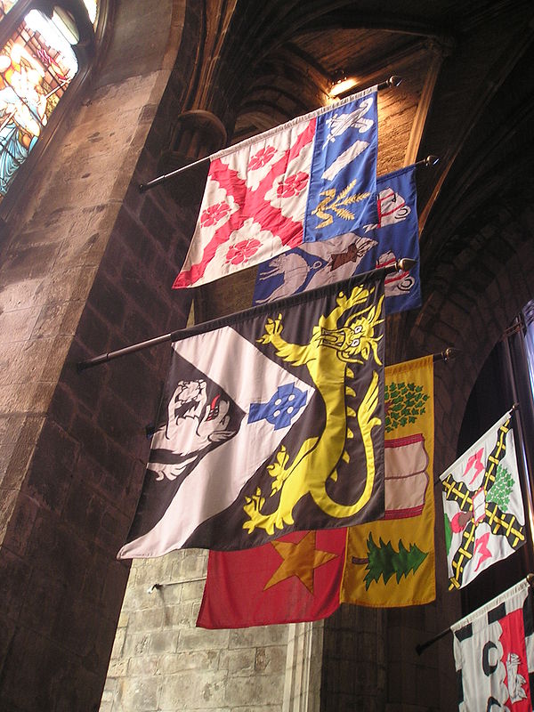 Lord Wilson's heraldic banner as Knight of the Order of the Thistle in St Giles' Cathedral, Edinburgh.