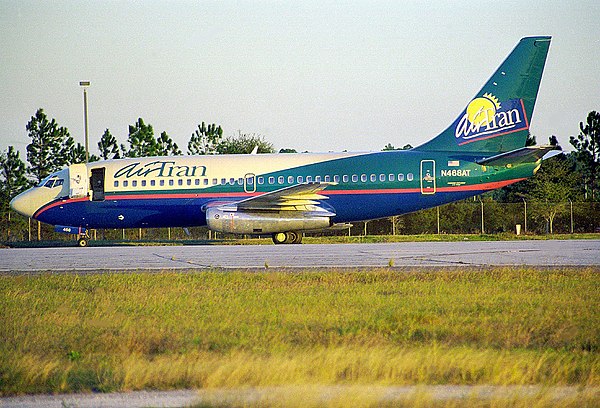 An AirTran Boeing 737-200 in the original livery at Orlando International Airport