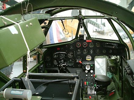 Bolingbroke IV cockpit. The Blenheim Mk IV cockpit was similar, but with a shorter instrument console. The navigator's position was in the nose, in front of the pilot. The ring and bead gunsight for the forward firing guns is visible.