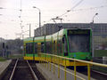 Combino wjeżdża na pętlę Sobieskiego (Combino arriving at the Sobieskiego terminus)