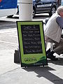 A notice at the Red Jet terminal, Fountain Quay, Cowes, Isle of Wight, advising bus passengers that, due to it being Cowes Week at the time, route 1 would not serve the Fountain Quay and would operate from the Co-op instead.