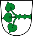 Stadt Schönsee In Silber ein aus dem linken Schildrand wachsender, waagrechter grüner Seerosenstock mit drei grünen Blättern.