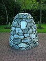 The 9/11 commemorative cairn near the play area.