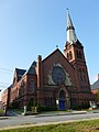 Eliot Presbyterian Church, located at 273 Summer Street, Lowell, Massachusetts. East and north (front) sides of building shown.