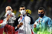 Frank Stäbler, Mohammad Reza Geraei and Parviz Nasibov with their Olympic medals at Tokyo 2020.jpg