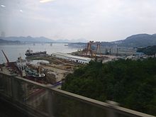 The Baima River in its lower course, seen from the railway bridge