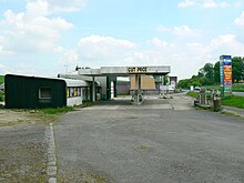 The Golden Arrow petrol station near Froxfield, Wiltshire, where Ryan attempted to shoot the cashier (pictured in 2010) Golden Arrow Service Station, Froxfield, Marlborough (1) - geograph.org.uk - 1870035.jpg
