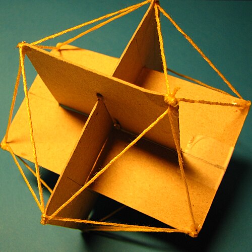 Three interlocking golden rectangles inscribed in a con­vex regular icosahedron