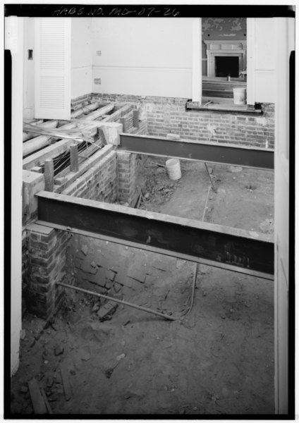 File:INTERIOR VIEW, HALL TO CENTER REAR OF HOUSE, CONSTRUCTION VIEW WITH FLOOR REMOVED (TO ADD I-BEAMS) REVEALS THE TOP OF THE VAULTED BRICK WINE CELLAR IN THE BASEMENT (CRUCIFORM HABS MD,17-COLTO.V,1-33.tif