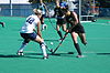 The 2010 Iowa field hockey team (in black) in action at Penn State