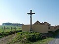 English: Cross at house No 53 in the village of Jinín, Strakonice District, Czech Republic. Čeština: Kříž u domu č.p. 53 v obci Jinín v okrese Strakonice.