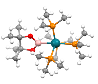 Structure of (PMe3)4RhB(pinacolate). (color code: pink=B, blue green=Rh, red=O, orange=P). KUHPAG.png