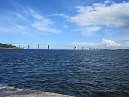 A large road bridge stretching over a body of water