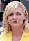 Een foto van Dunst die het filmfestival van Cannes 2016 bijwoont