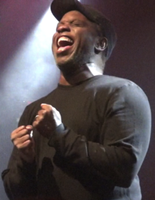 Glover performing with Living Colour in 2012 Loz corey mmm.png