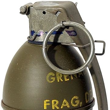 M61 grenade (1959-1968), with safety clip around the lever and the bent tip of the safety pin at top