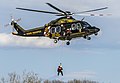 * Nomination: Maryland State Police AW139 Trooper 3 conducting hoist exercises --Acroterion 02:10, 16 March 2022 (UTC) * Review  Oppose very tight crop, processing flaws (halo round man and treeline to the left) --Virtual-Pano 10:07, 16 March 2022 (UTC) Wider crops tend to make the men on the hoist incidental to the image. I'll lookat correcting the artifacts. Acroterion 12:04, 16 March 2022 (UTC) I can't find a halo around the man, but the distortion of the trees on the left is the helicopter's hot exhaust stream distorting the air. Acroterion 01:46, 17 March 2022 (UTC) Sorrry I did not realize it is exhaust down wash (corrected above) -- halo around man (sharpening result?) is already visible in thumb view --Virtual-Pano 18:14, 17 March 2022 (UTC)