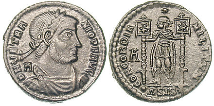 On the reverse of this coin struck under Vetranio, the emperor is holding two labara, the ensigns introduced by Constantine I