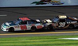 Newman tandem racing with Dale Earnhardt Jr. during the 2011 Gatorade Duels at Daytona Newman Pushes Junior at Daytona 2011.jpg