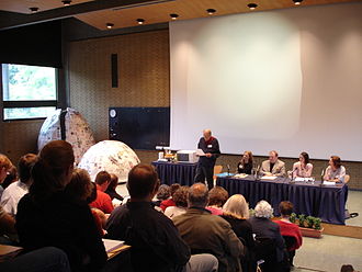 Harlan Walker speaking on "Eggs in Cookery", the 2006 theme. Panellists, seated, left to right: Jane Levi, Paul Levy, Marina Warner, Claudia Roden. OSFC 2007 1 Tilson.JPG