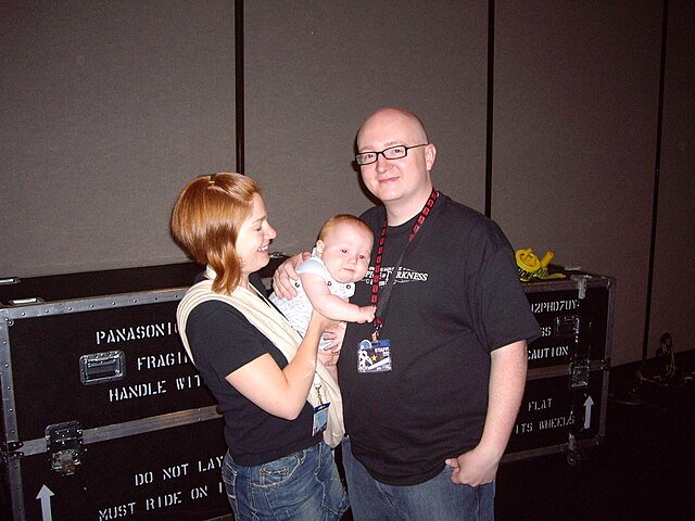 Jerry Holkins, his wife Brenna, and their daughter Samantha at PAX 2006