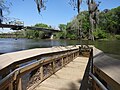 Ramp down to Flint River w Broad Ave Bridge