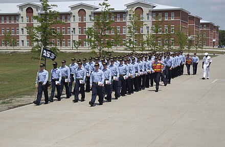 Recruits march from their "ship" barracks named for USS Chicago (SSN-721)