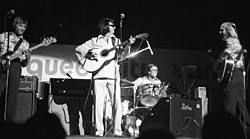 Orbison, center (in white), performing in 1976
