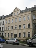 Apartment building in closed development with front garden